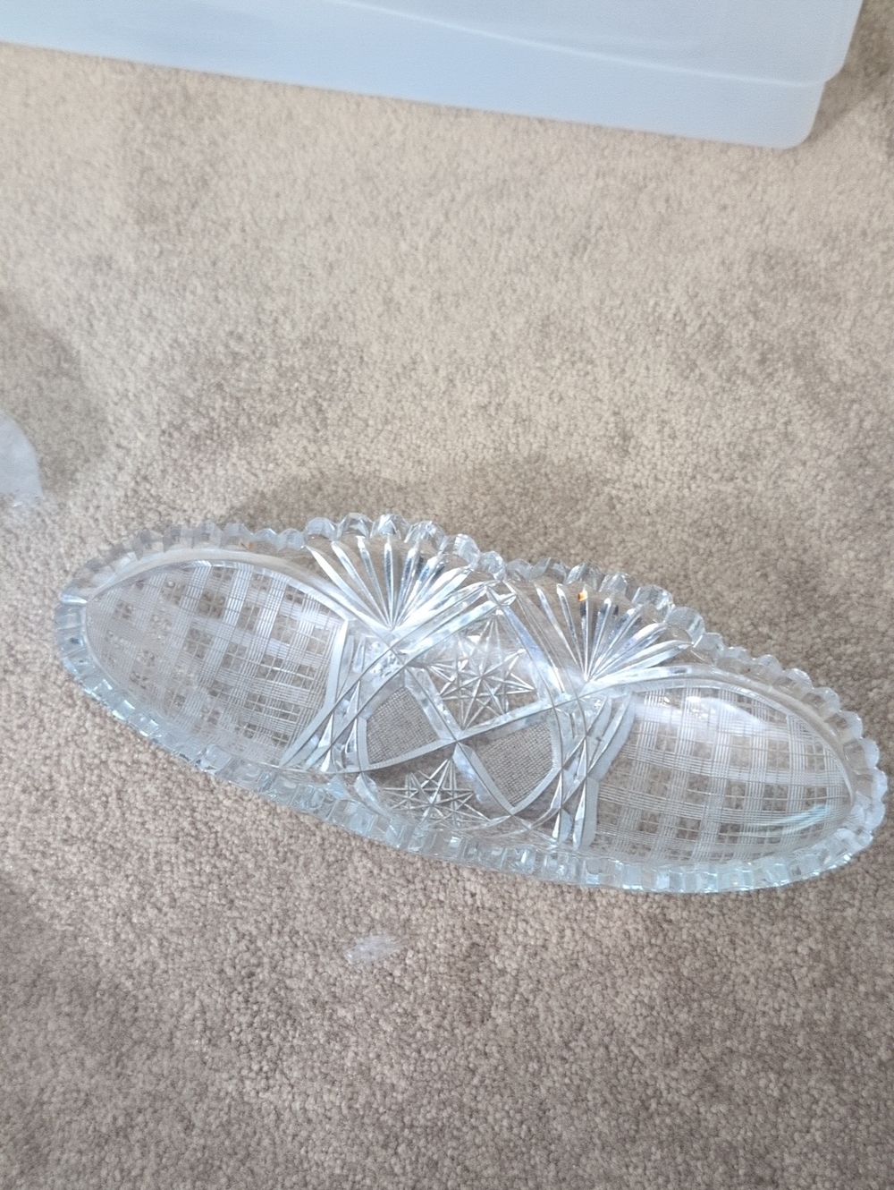 This is an American Brilliant Period cut glass celery dish.